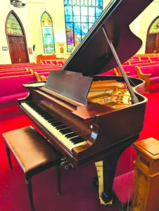 A century of music restored: Historic Steinway returns home to First United Methodist